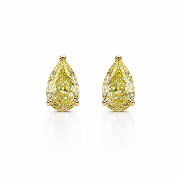 6.01 Each Yellow Pear Shaped Studs